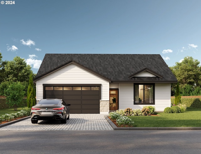 view of front facade featuring a garage and a front lawn