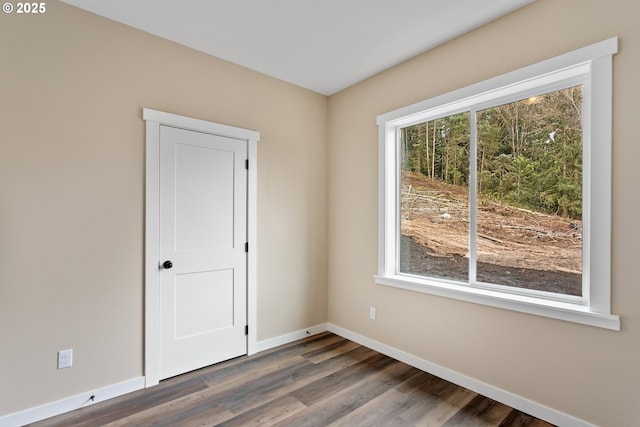 144 E H St, Vernonia, OR 97064 - unfurnished room with baseboards and dark wood finished floors