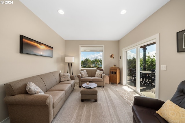 living room featuring light carpet