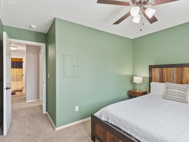 bedroom with white fridge, ceiling fan, electric panel, and light colored carpet