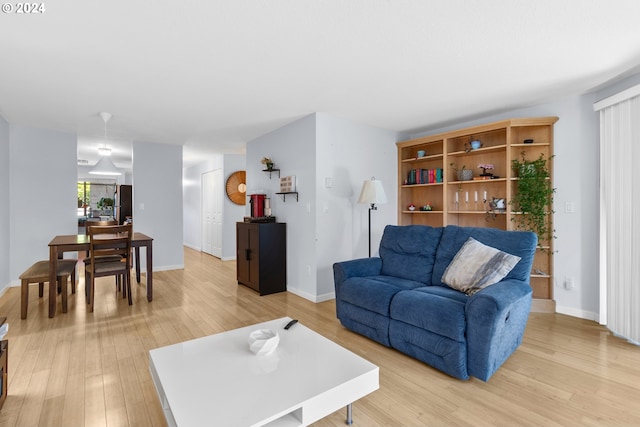 living room with light hardwood / wood-style floors