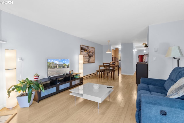 living room featuring light hardwood / wood-style floors and baseboard heating