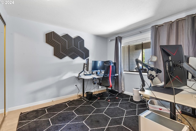 workout room with hardwood / wood-style flooring