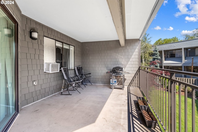 balcony featuring area for grilling and cooling unit