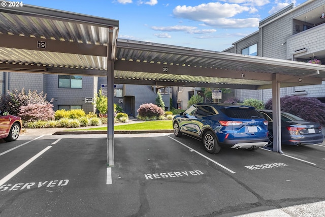 view of parking with a carport