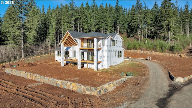 view of front of home with a balcony