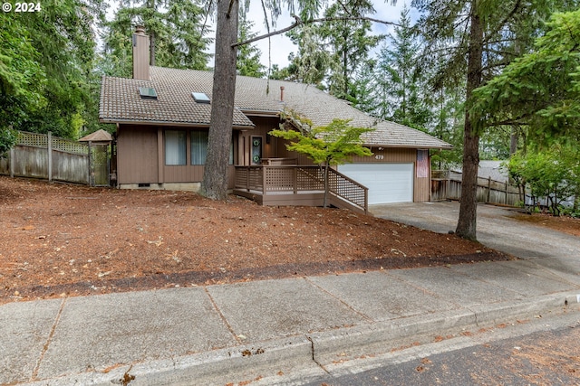 single story home with a garage