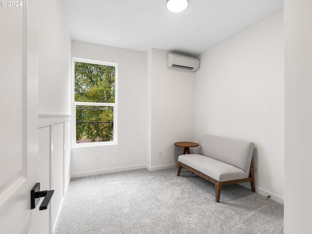 living area with light colored carpet and a wall mounted air conditioner