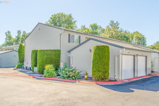 exterior space featuring a garage