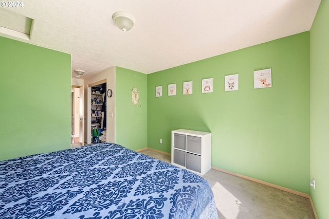 bedroom featuring carpet floors and a closet