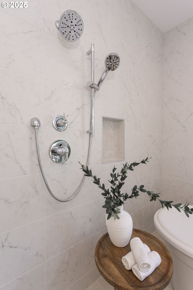 full bath featuring tile walls and tiled shower