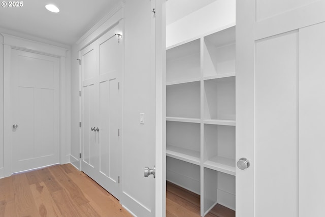 hallway featuring wood finished floors