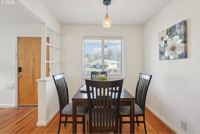 dining area featuring hardwood / wood-style flooring