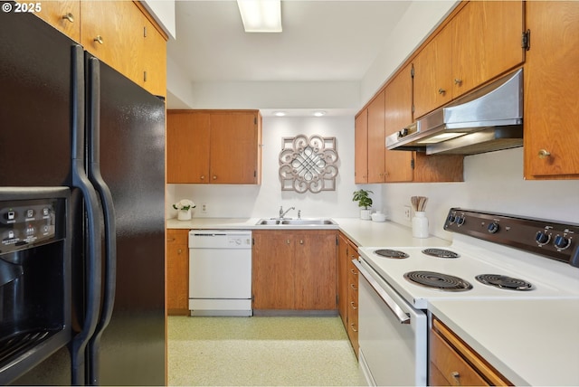 kitchen featuring sink and white appliances