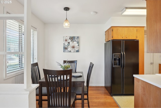 dining area featuring light hardwood / wood-style flooring