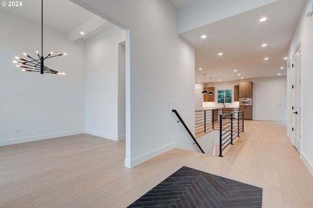 corridor featuring light hardwood / wood-style floors