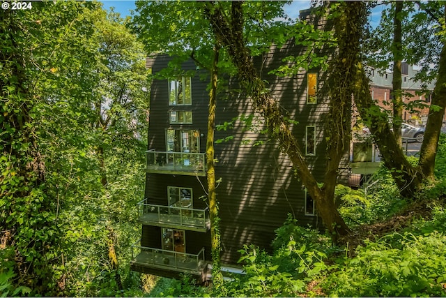 view of home's exterior featuring a balcony