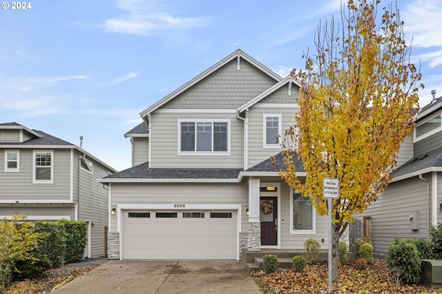 craftsman-style house with a garage