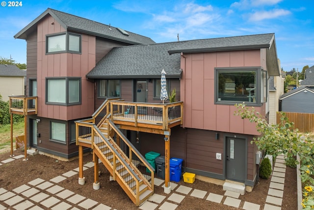 rear view of house with a deck