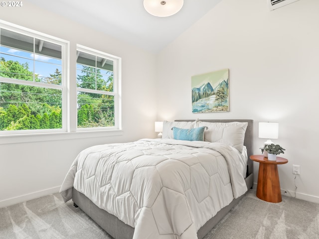 carpeted bedroom featuring lofted ceiling