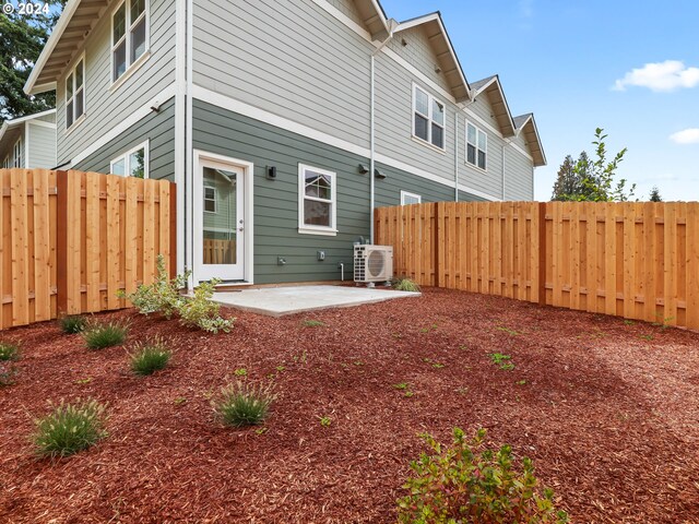 back of house with a patio