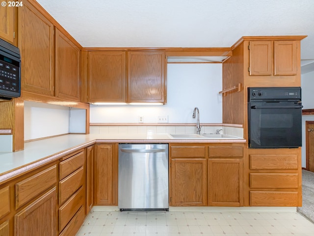 3242 NE 29th St, Gresham, OR 97030 - kitchen with dishwasher, oven, light flooring, and light countertops