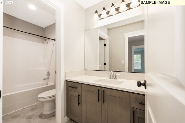 full bathroom featuring toilet, tile patterned flooring, vanity, and tub / shower combination