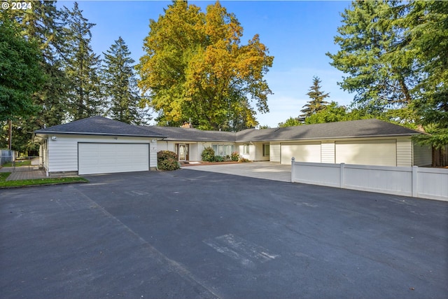 single story home featuring a garage