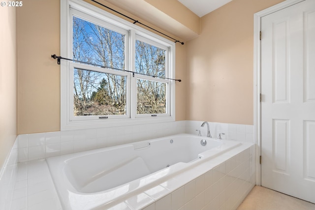 bathroom with tiled tub