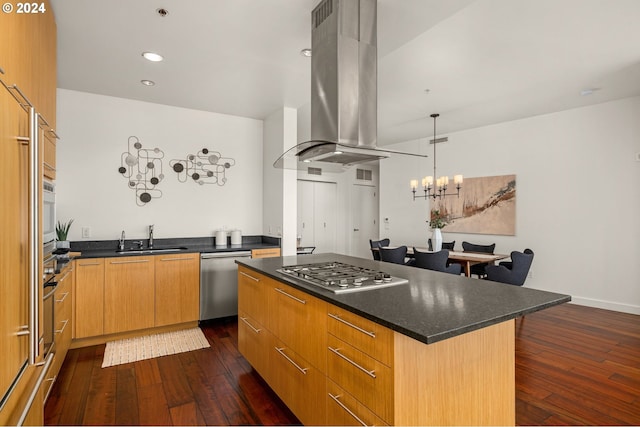 kitchen with dark wood-type flooring, sink, island range hood, a kitchen island, and appliances with stainless steel finishes