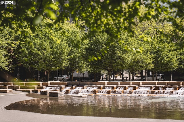 view of home's community featuring a water view