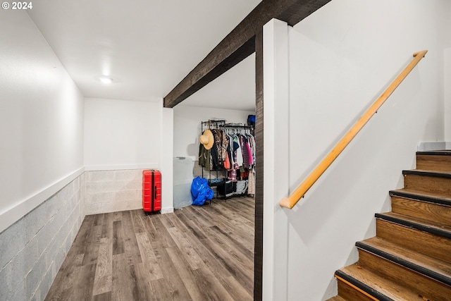 staircase featuring hardwood / wood-style floors