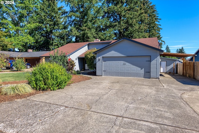 ranch-style home with a garage