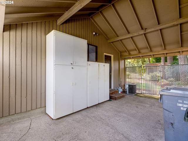 exterior space featuring lofted ceiling