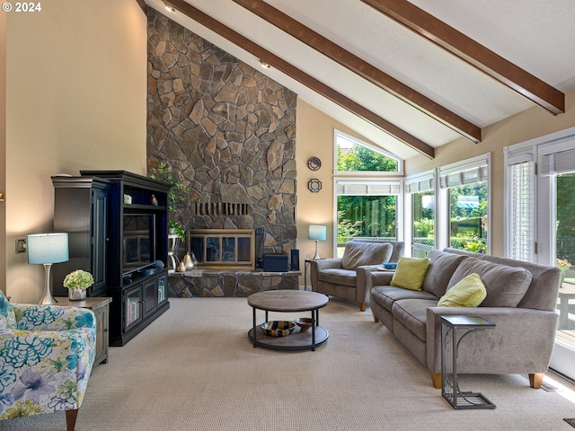 carpeted living room featuring beam ceiling, a stone fireplace, and high vaulted ceiling