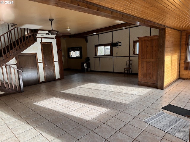 unfurnished room with ceiling fan, light tile patterned floors, and wooden ceiling