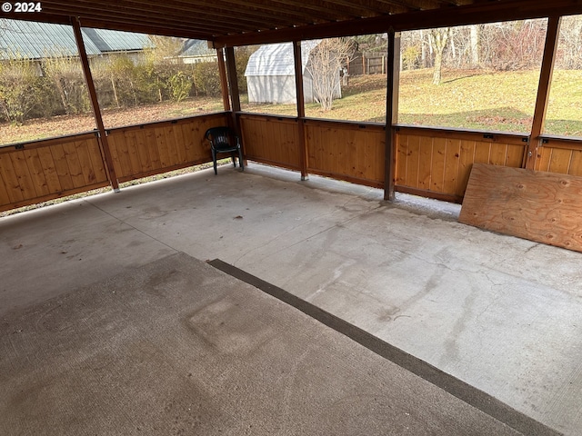 unfurnished sunroom featuring a wealth of natural light