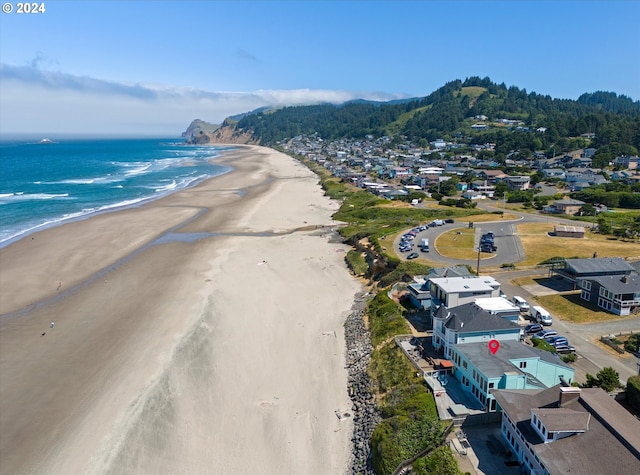 aerial view featuring a beach view and a water view