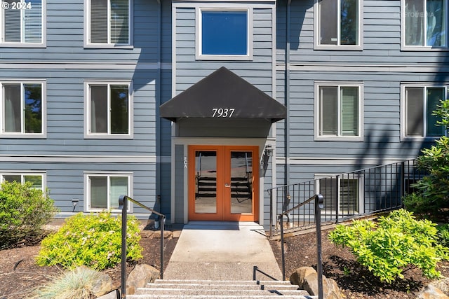 entrance to property featuring french doors