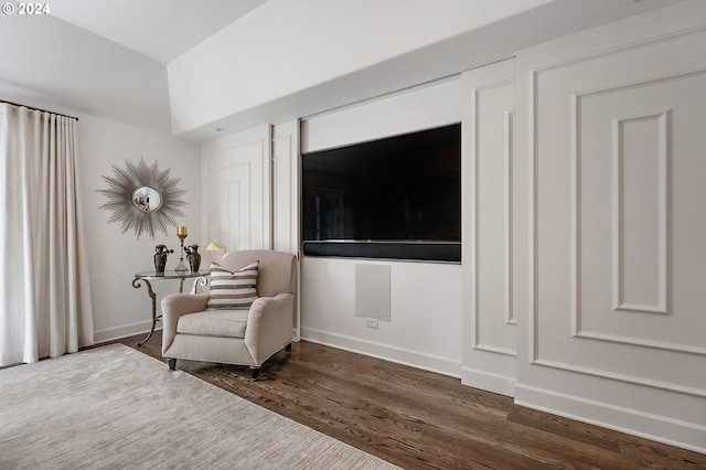 living area featuring dark wood-type flooring