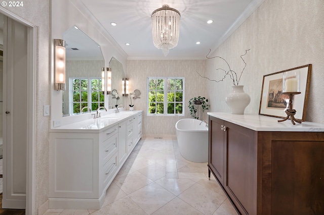 bathroom featuring vanity, an inviting chandelier, tile patterned flooring, crown molding, and a washtub