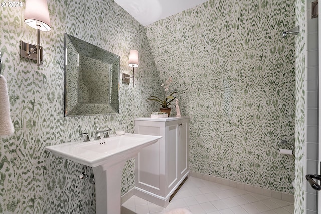 bathroom with tile patterned flooring