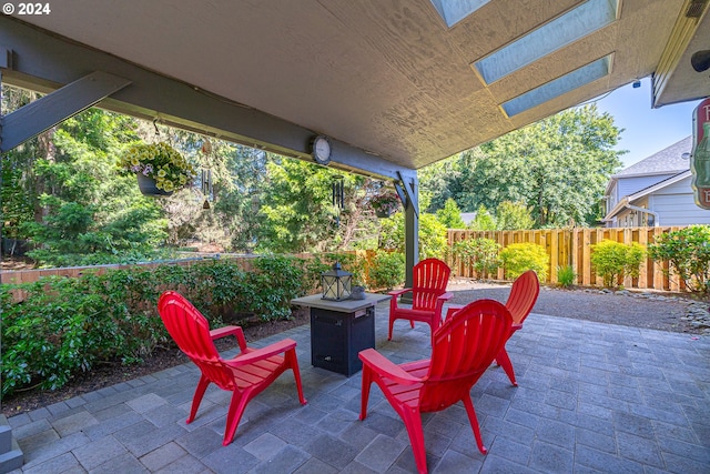 view of patio featuring a fire pit