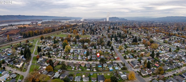 bird's eye view with a water and mountain view