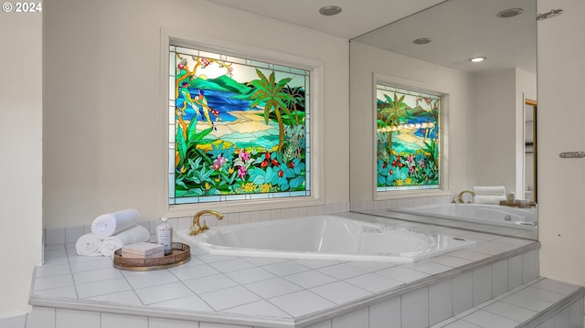 bathroom with tiled tub