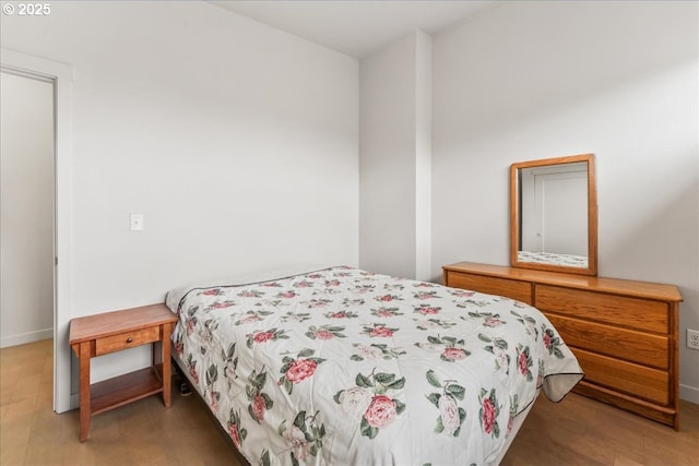 bedroom with baseboards