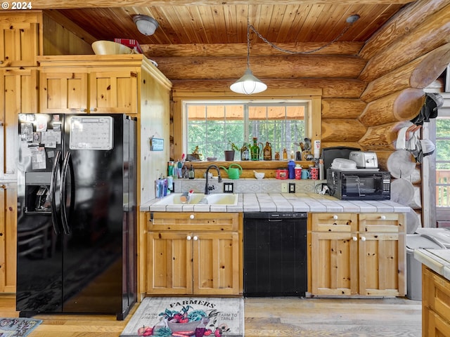 kitchen with wooden ceiling, black appliances, light hardwood / wood-style floors, and rustic walls