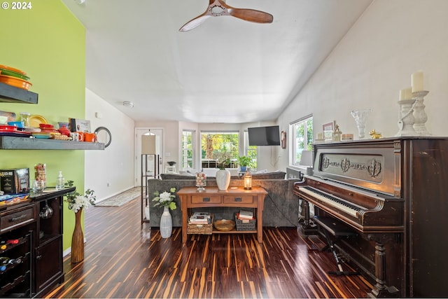 interior space with ceiling fan and dark wood-type flooring