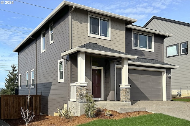 view of front of property with a garage