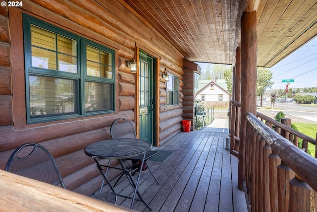 wooden terrace with covered porch